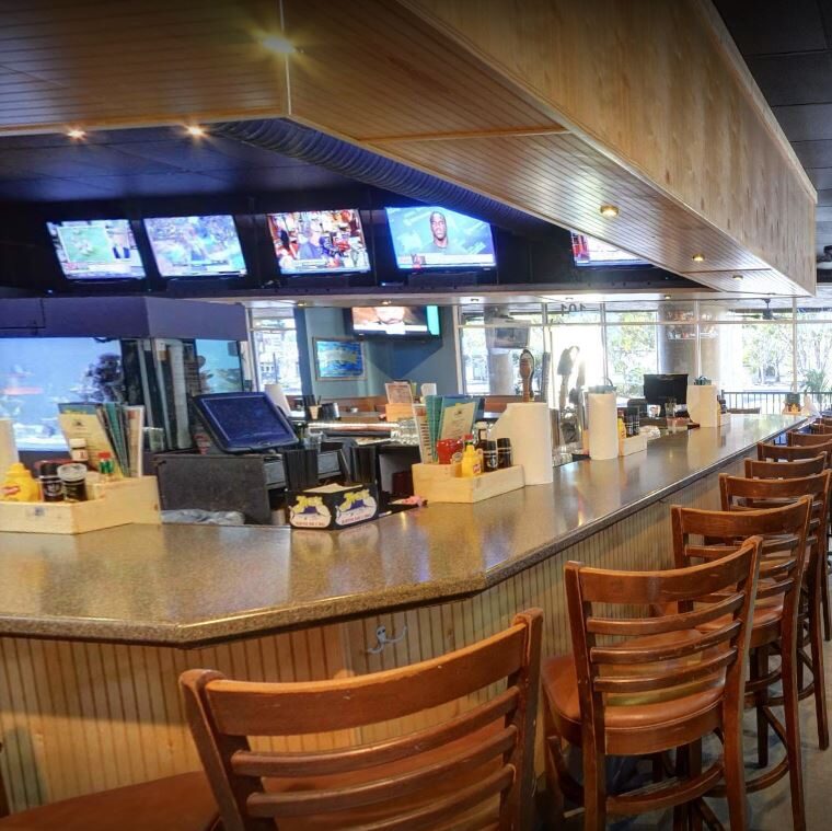 Sports bar with TVs in Naples