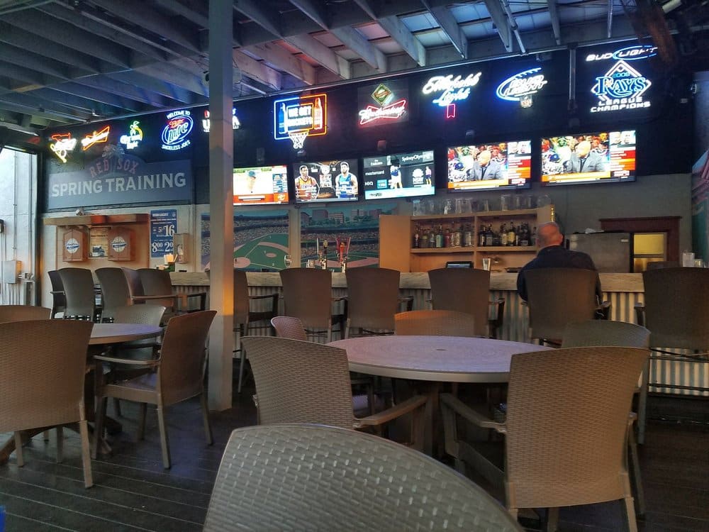 Shoeless Joes Sports Cafe in Fort Myers Outside patio bar and dartboards