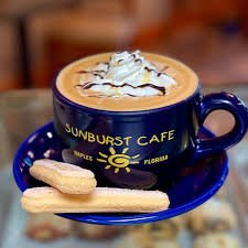 Sunburst Cafe coffee with whip cream and foam
