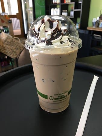 Iced coffee with whipped cream at Living Vine Organic Cafe in Fort Myers Florida
