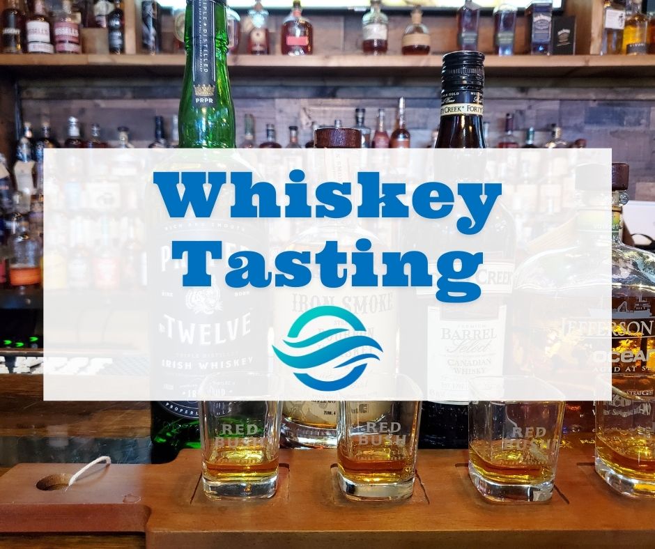Whiskey Tasting in front of a whiskey flight