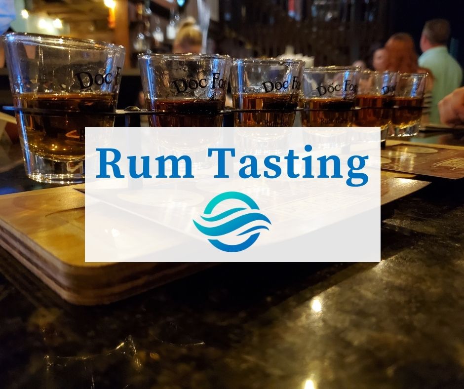 Rum tasting in front of a flight of rums