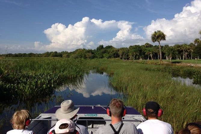 A family on an airboat tour in Naples