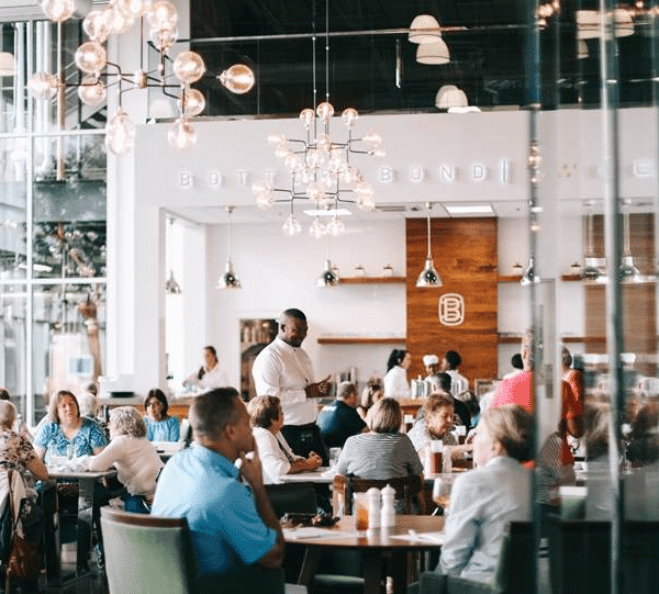 People inside Bardstown Bourbon Company