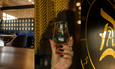 Glass of Bourbon at Dark Arts Whiskey House Barrel House Distillery